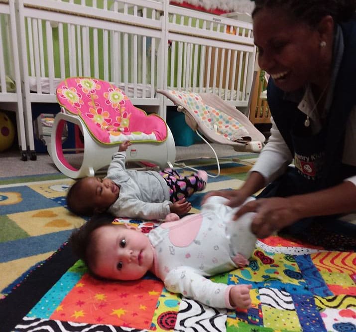 teacher-playing-with-infants-at-a-Preschool-Daycare-Serving-San-Antonio-TX